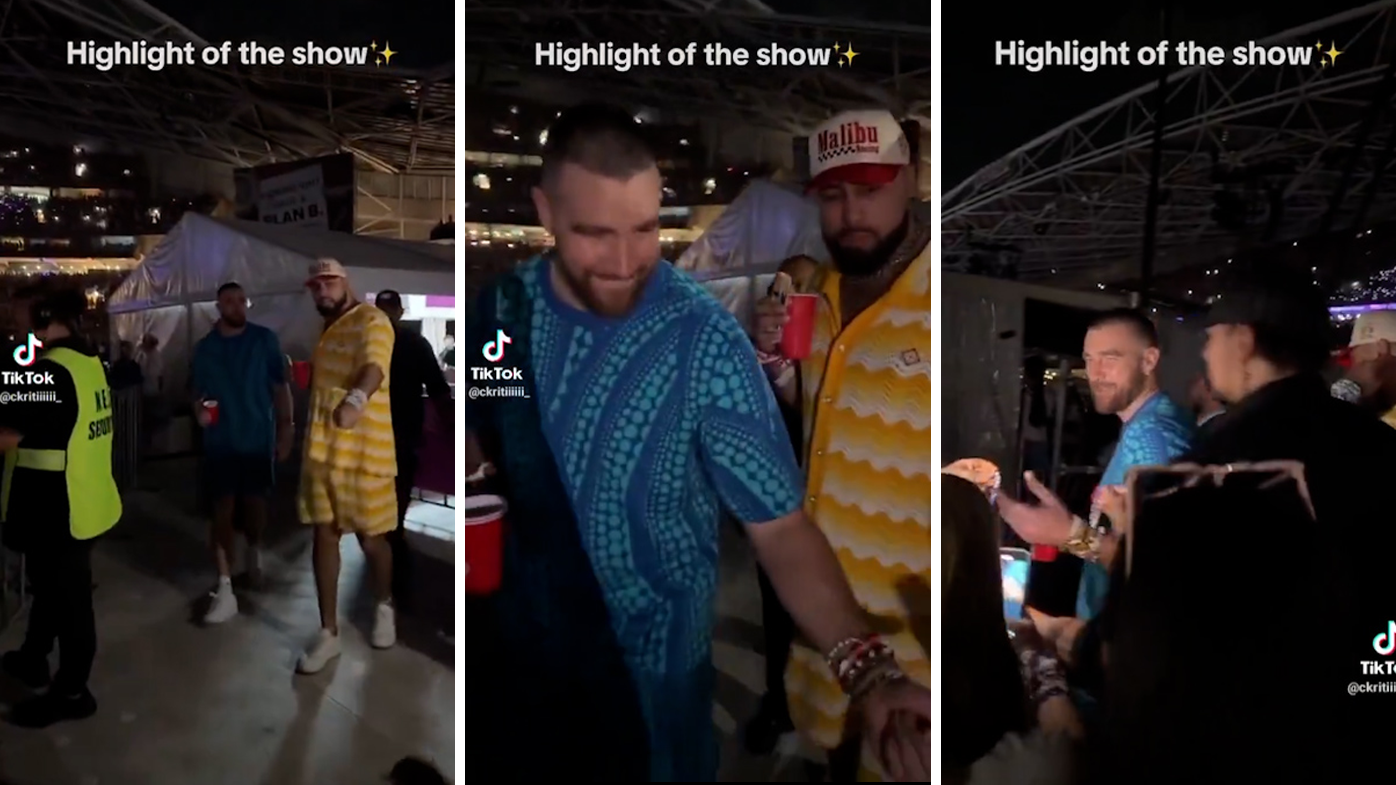 Travis Kelce gives fans guitar picks at first Taylor Swift Sydney show